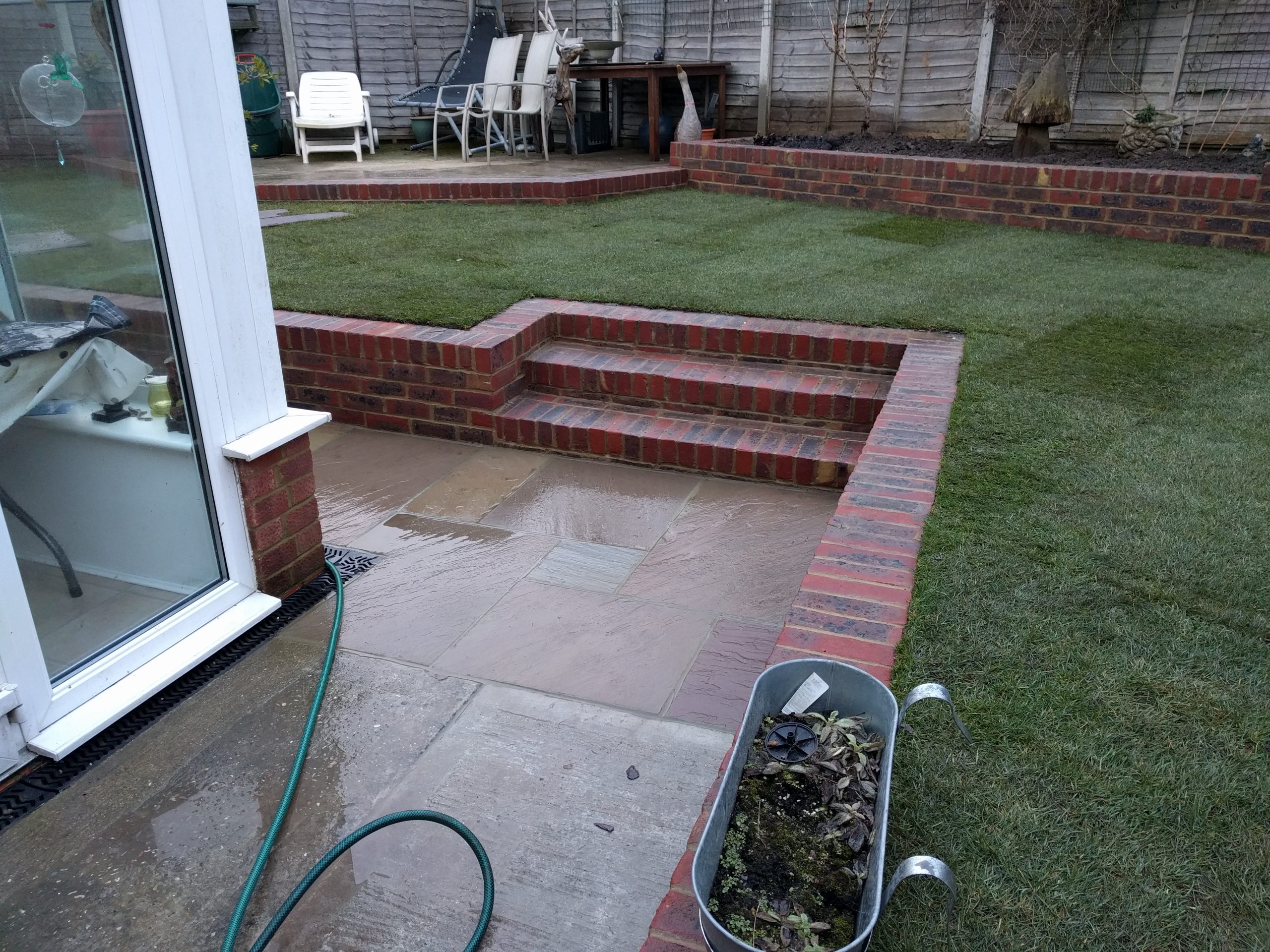 rear patio and lawn