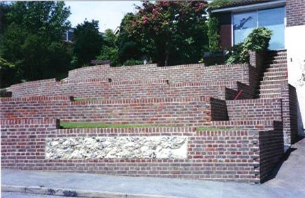 Ovingdean, flint panels in stock brick walls